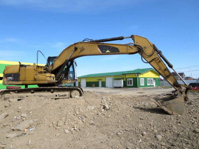  CAT 320 2010