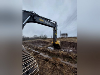 Гусеничный харвестер John Deere 260