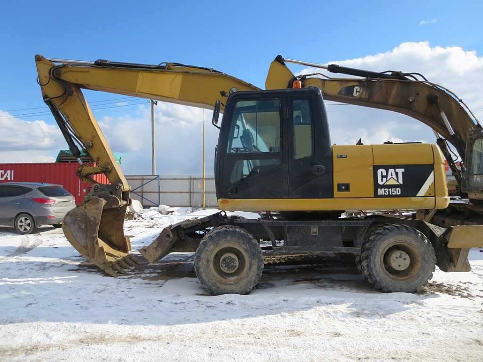  Экскаватор Caterpillar M315D  2013 года