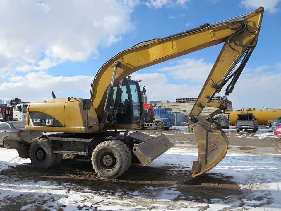  Экскаватор Caterpillar M315D  2013 года
