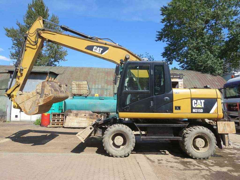  Экскаватор Caterpillar M 315 D  2012 года